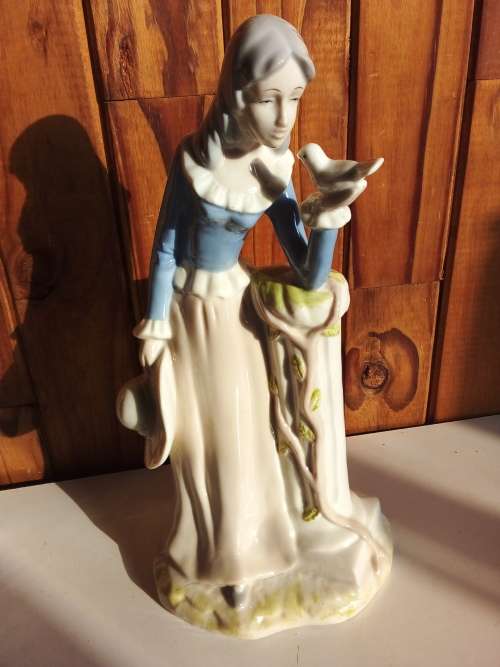 Lady with Bird Glazed Porcelain Figurine
