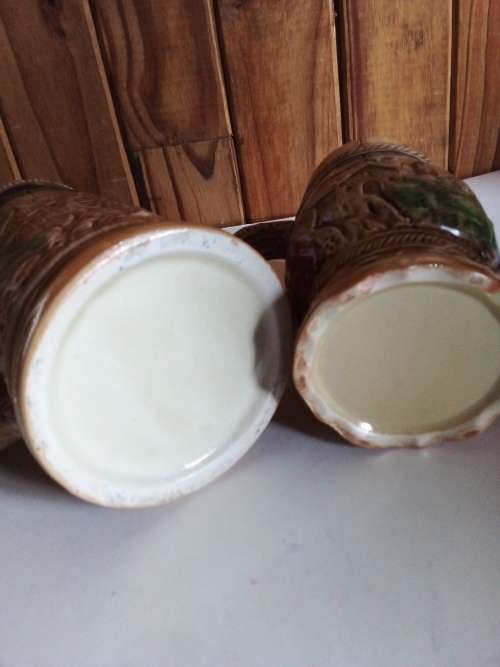 Two Tankards with Raised Detail for One Bid