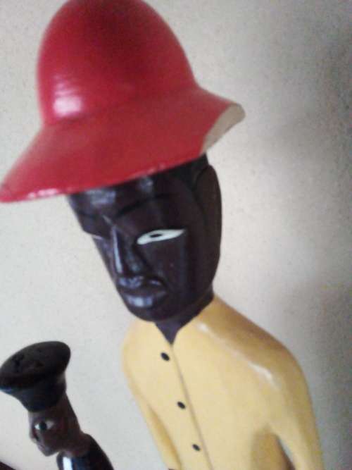 Two Wooden Colonial Style Figurines