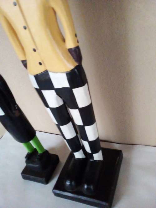 Two Wooden Colonial Style Figurines