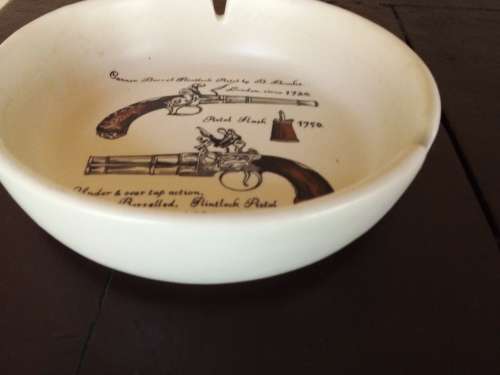 Vintage Ashtray with Imprint of Old Pistols