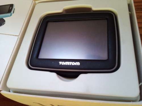 Old Tomtom Navigator with Charger