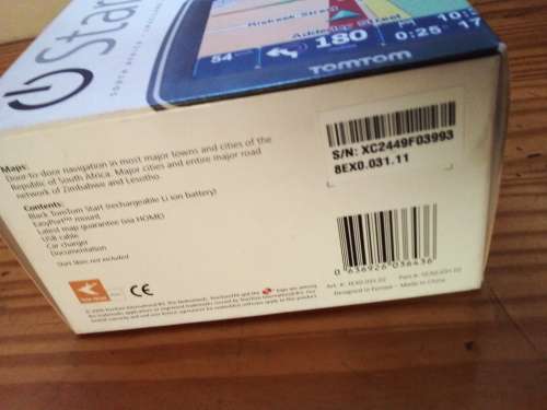 Old Tomtom Navigator with Charger