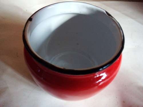Red Enamelware Container with Black Trim and White Interior