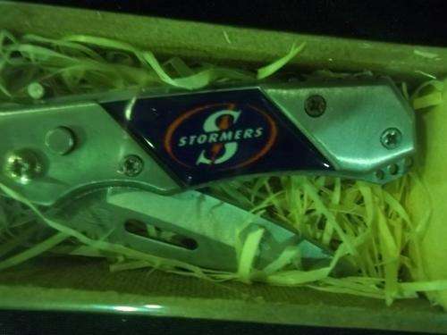 1 left WOW (STOMER  ) POCKET KNIFE  COLLECTION IN HOLDER RAP NOT USE