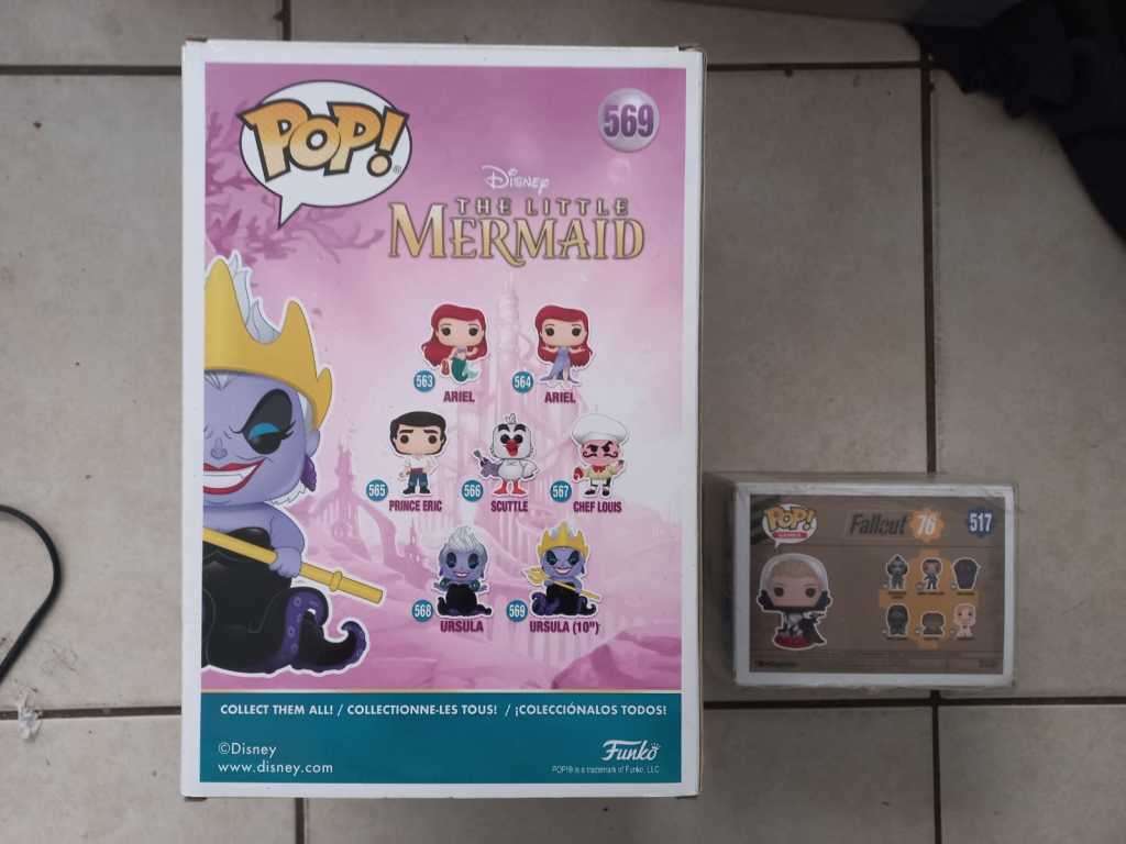 Ten inch glow in the dark Ursula funko pop, limited edition, never opened. (Fallout funko for scale)