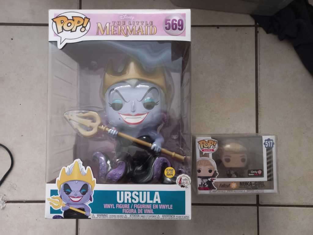 Ten inch glow in the dark Ursula funko pop, limited edition, never opened. (Fallout funko for scale)