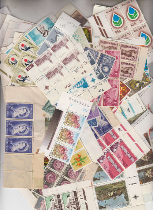 Three KG box filled with thousands of stamps off paper,packets,pages with stamps, MNH controls etc.