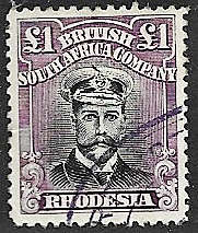 BSACo super  One pound fiscally used with feather in cap variety SACC 278? black and bright purple