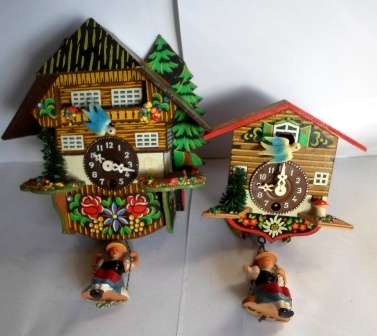 WOW!! PAIR OF VINTAGE SWINGING LADY CLOCKS BOTH NOT WORKING, FOR REPAIRS