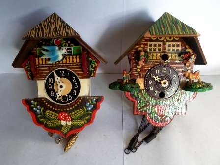PAIR OF MINIATURE GERMAN WALL CLOCKS BOTH ARE FOR REPAIRS OR SPARES