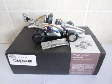 F1 FANS!! BOXED TROIKA WIND UP F1 CAR DESK PIECE DESIGNED BY HAUKE MURKEN & SVEN HANSEN WORKING!!