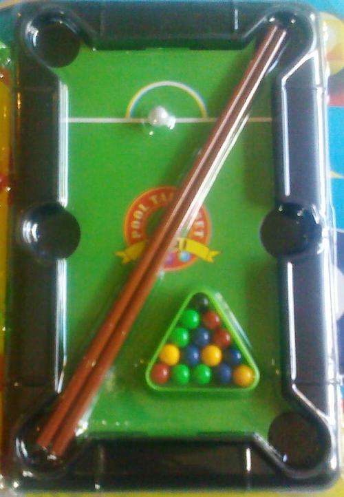 To cute small Pool Table. Includes 2 cue's, balls and triangle.