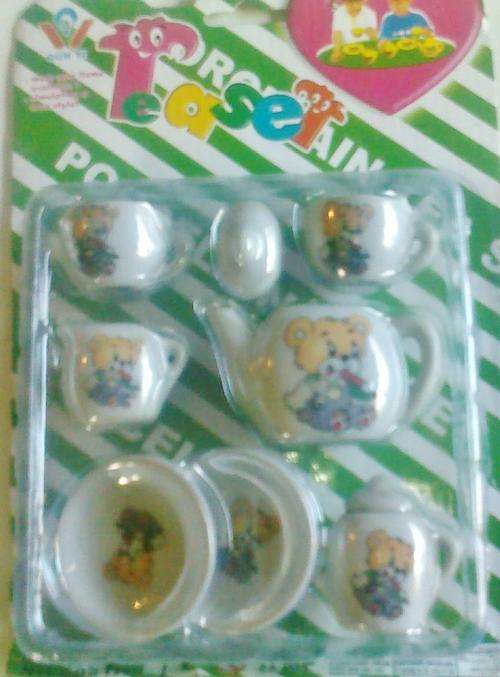 8 Piece Porcelain Tea set. To cute!!!