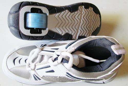 HEELIES.  You can choose between size 11,12,13,1,2 or 3. White and Silver.