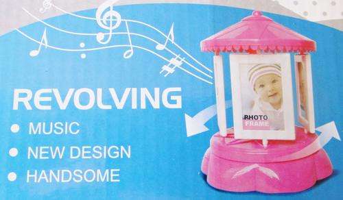 Revolving Musical Photo Frame.  Diffrent Colours available.
