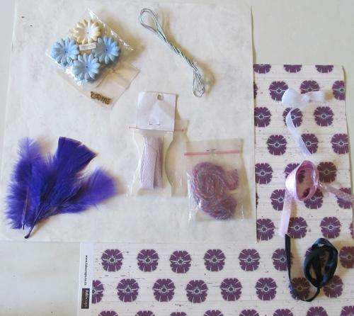 2 Page Layout.  Includes, paper, ribbons, buttons, funky feathers, templates, ect,ect,ect