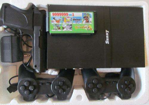 Game console with 2 remotes, A/V Cables, Laser gun, Transformer and game cartridge!!!!
