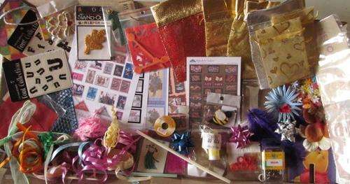 Scrapbooking kit. Each kit is diffrent and consists of all sorts of odds and ends.To much to mention
