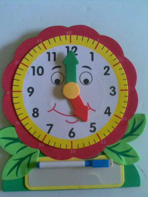 Foam clock with white board and marker pen ***Postage only R30 and R10 per additional item***