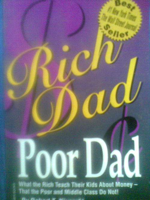 Rich Dad Poor Dad by ROBERT T.KIYOSAKI condition like new, postage only R30 and 10 per additional it
