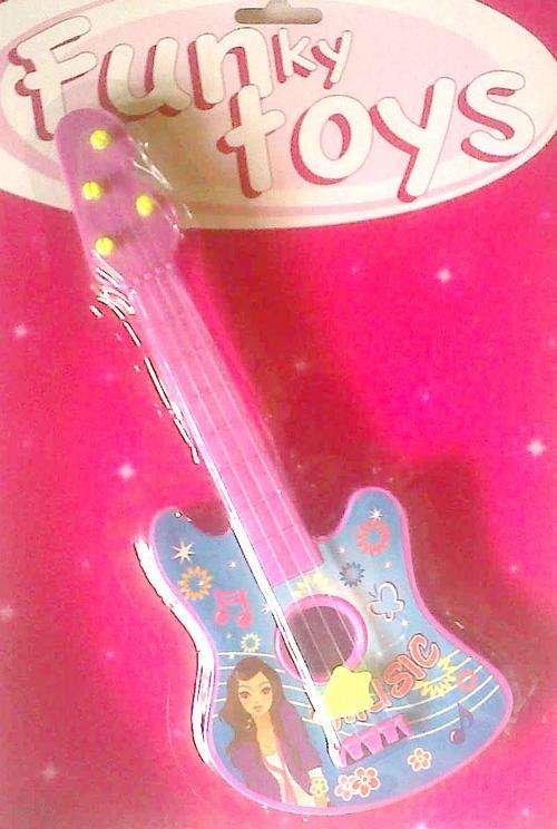 Little girls battery operated guitar.