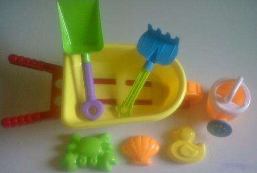 Perfect for the beach, 7 piece sandpit set!!! Including wheelbarrow