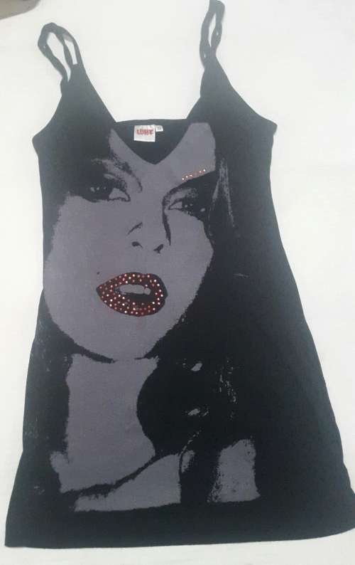 Make a statement in this long length sexy top by Legit! Size 34