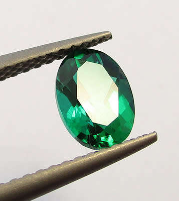 Emerald Simulant. Lab created Gemstone . 7x5mm Oval
