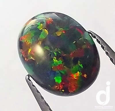 Black Opal Cabochon. Oval. 0.80ct | 9x7mm
