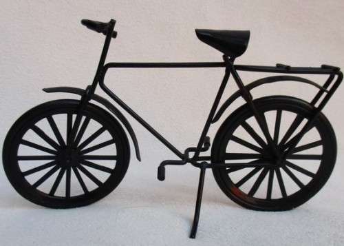 A SMALL WELL MADE METAL BICYCLE WITH MOVING WHEELS!!