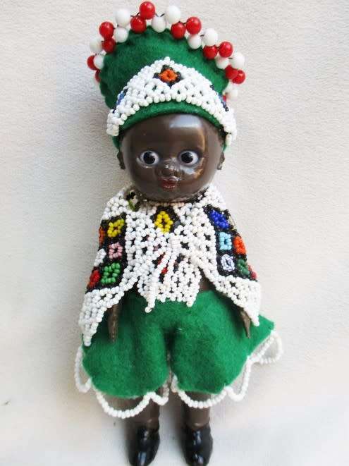 A SMALL VINTAGE BLACK DOLLY IN BEAUTIFUL NDEBELE BEADED OUTFIT AND HAT!!