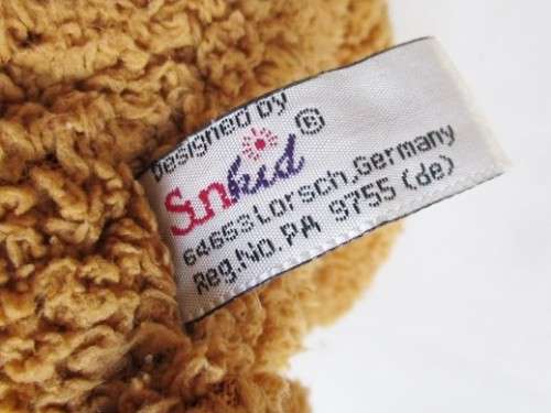 A VERY COLLECTABLE SUNKID, GERMANY WITH ORIGINAL BUTTON AND DROP STITCH NOSE!!