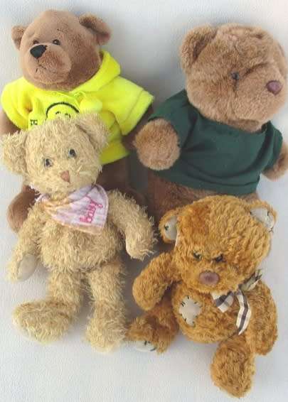 A BUNCH OF TEN NICE-SIZED, SOFT, CLEAN TEDDY BEARS