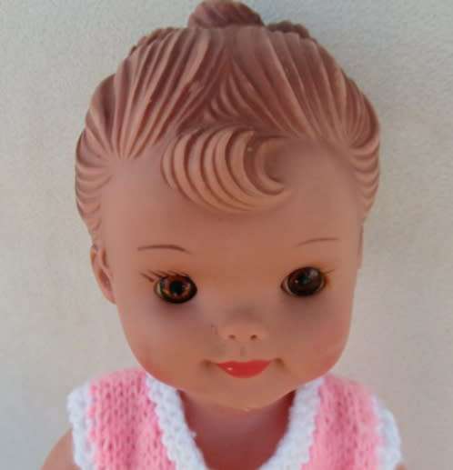A LOVELY VINTAGE DOLL WITH A SWEET INNOCENT FACE - MARKED 'SAD' ON BACK OF HEAD
