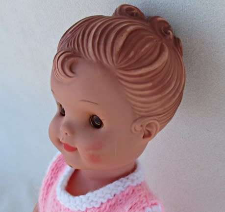 A LOVELY VINTAGE DOLL WITH A SWEET INNOCENT FACE - MARKED 'SAD' ON BACK OF HEAD