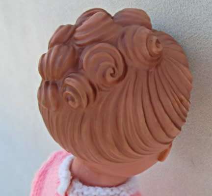 A LOVELY VINTAGE DOLL WITH A SWEET INNOCENT FACE - MARKED 'SAD' ON BACK OF HEAD