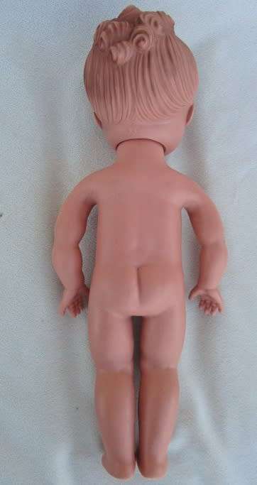 A LOVELY VINTAGE DOLL WITH A SWEET INNOCENT FACE - MARKED 'SAD' ON BACK OF HEAD