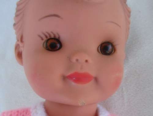 A LOVELY VINTAGE DOLL WITH A SWEET INNOCENT FACE - MARKED 'SAD' ON BACK OF HEAD
