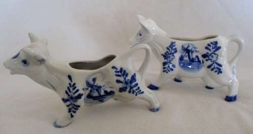 TWO HAND PAINTED DELFT BLUE COW CREAMERS - ONE DEFINITELY VINTAGE