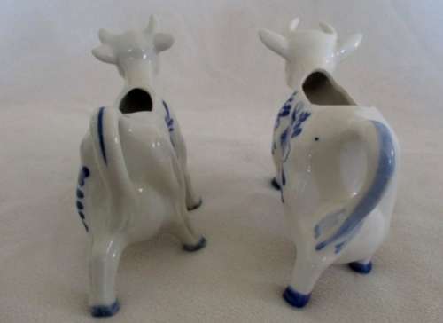 TWO HAND PAINTED DELFT BLUE COW CREAMERS - ONE DEFINITELY VINTAGE