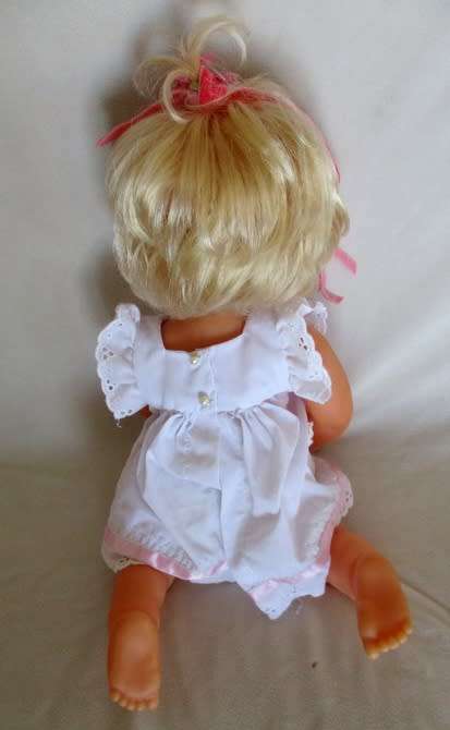 A PRETTY 44CM TALL FIRST LOVE DOLL WITH TWISTY BODY