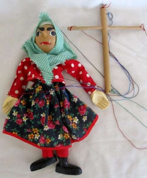 A VINTAGE WOODEN PUPPET