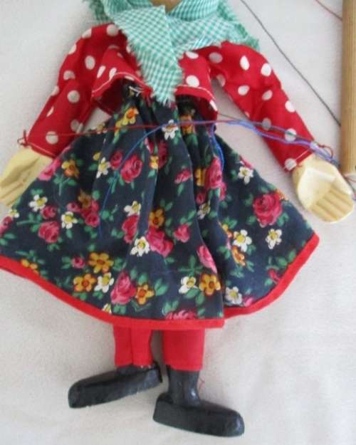 A VINTAGE WOODEN PUPPET