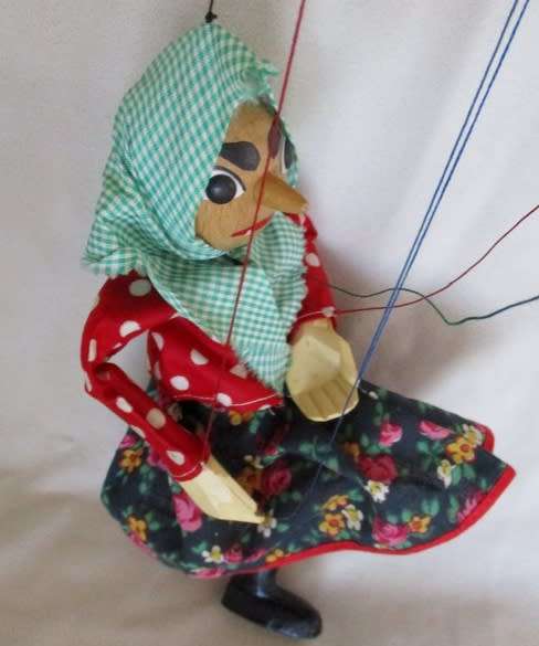 A VINTAGE WOODEN PUPPET