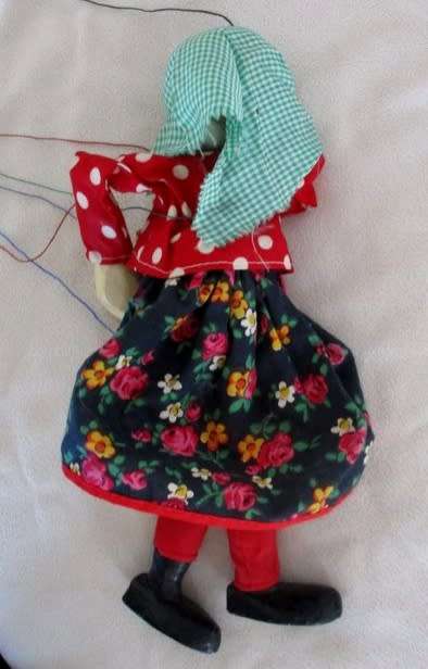 A VINTAGE WOODEN PUPPET