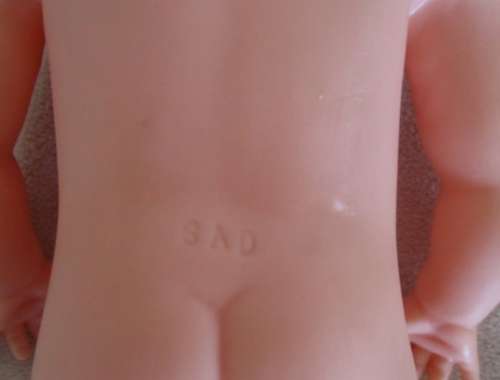 A SWEET VINTAGE 29CM TALL ROSY CHEEKED DARLING MARKED SAD ON BACK