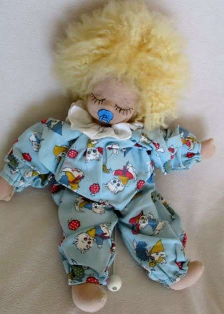 A SWEET VINTAGE MUSICAL PULL-STRING BABY DOLL IN CUTE KITTEN PJ's