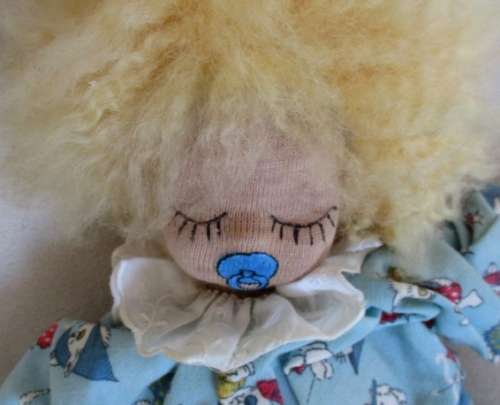 A SWEET VINTAGE MUSICAL PULL-STRING BABY DOLL IN CUTE KITTEN PJ's