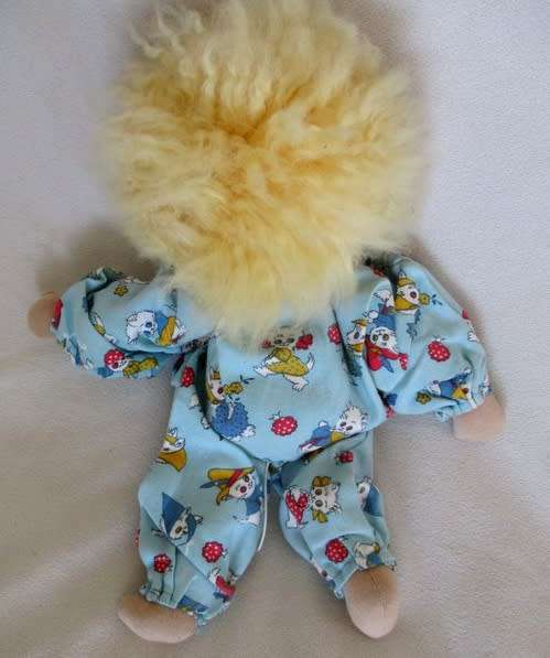 A SWEET VINTAGE MUSICAL PULL-STRING BABY DOLL IN CUTE KITTEN PJ's